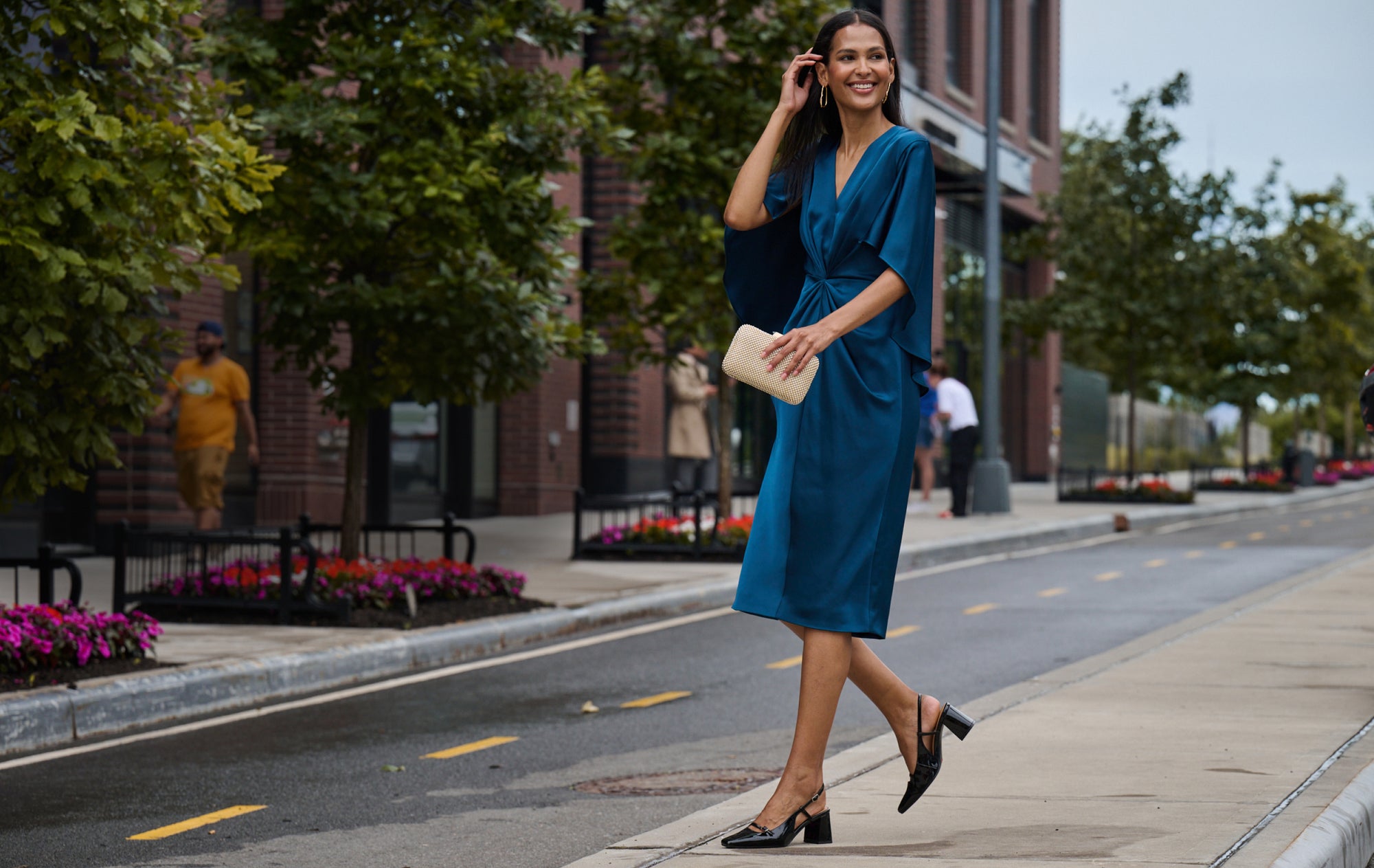 Editorial banner featuring model wearing Women's Total Motion Darby Pumps