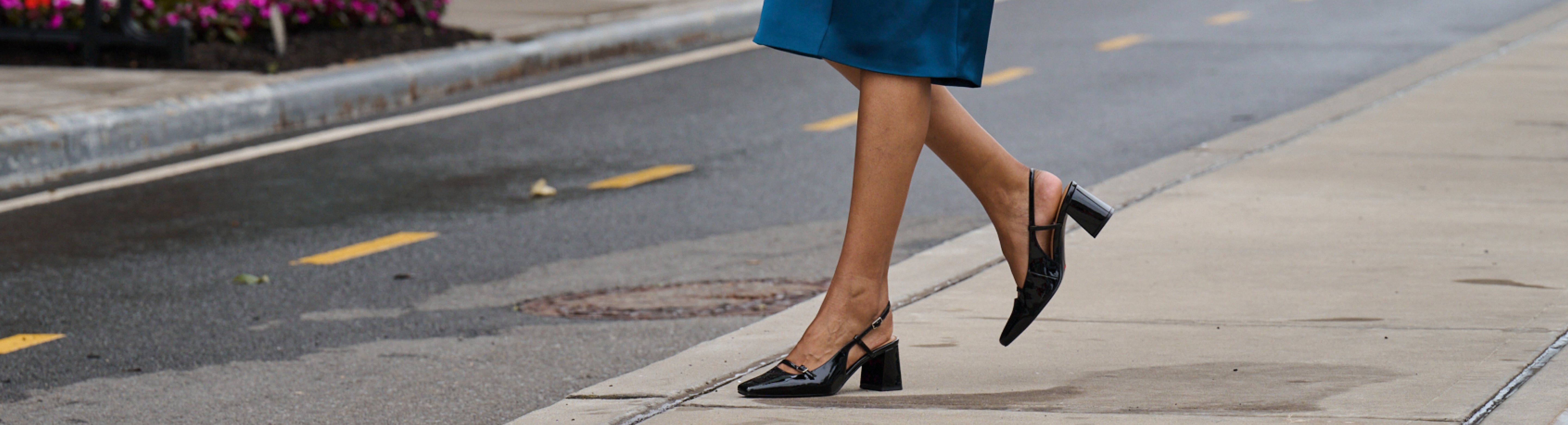 Editorial banner featuring women's dress collection style