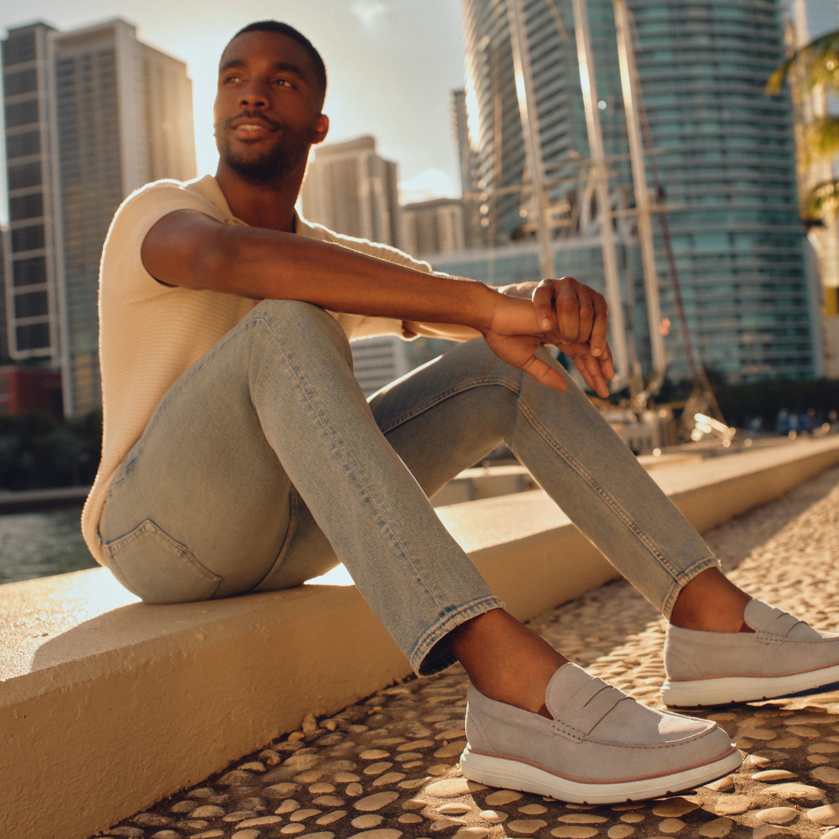 Editorial banner featuring model wearing Rockport Men's Total Motion style