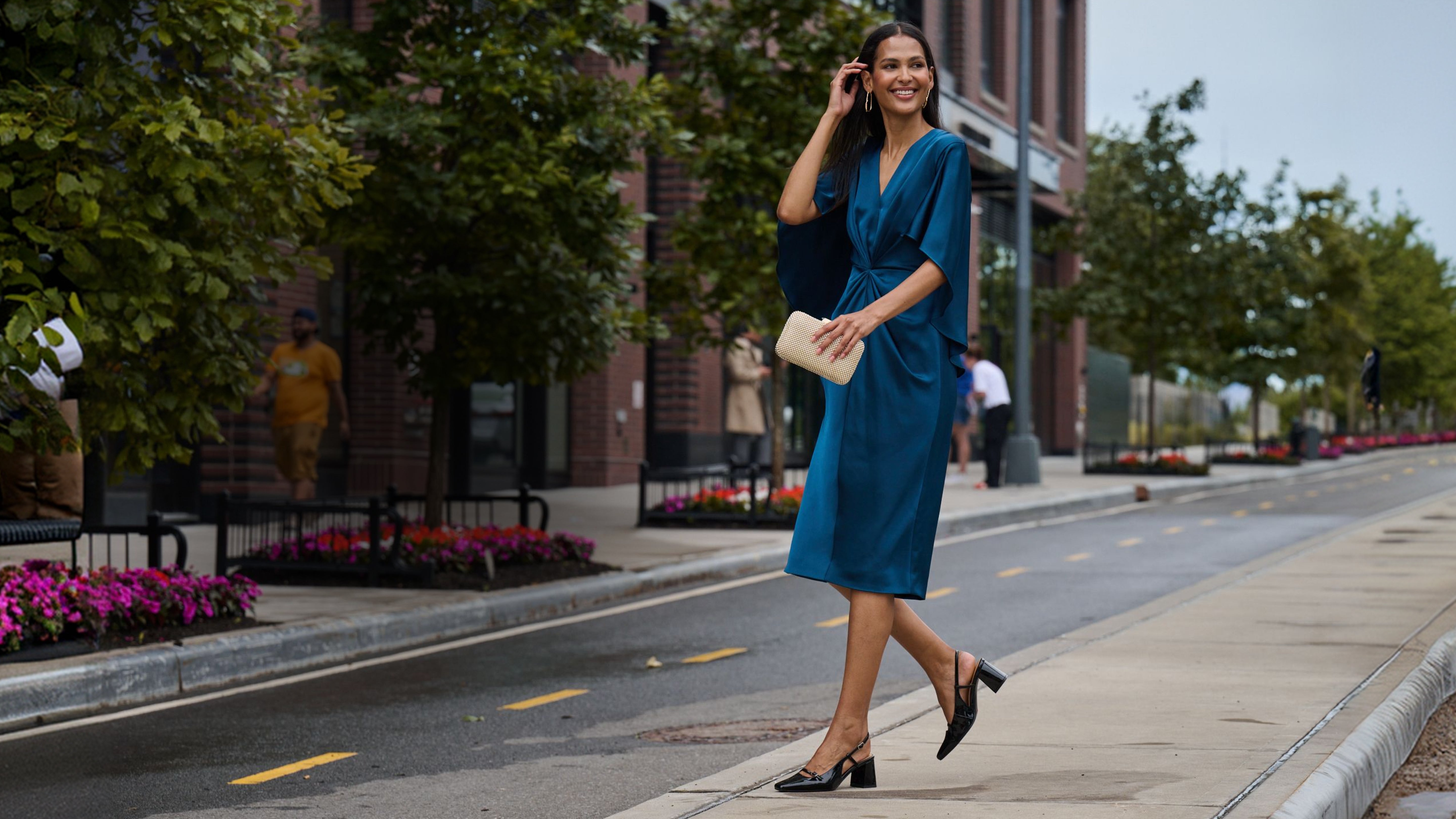 Editorial banner featuring model wearing Women's Total Motion Darby Pumps