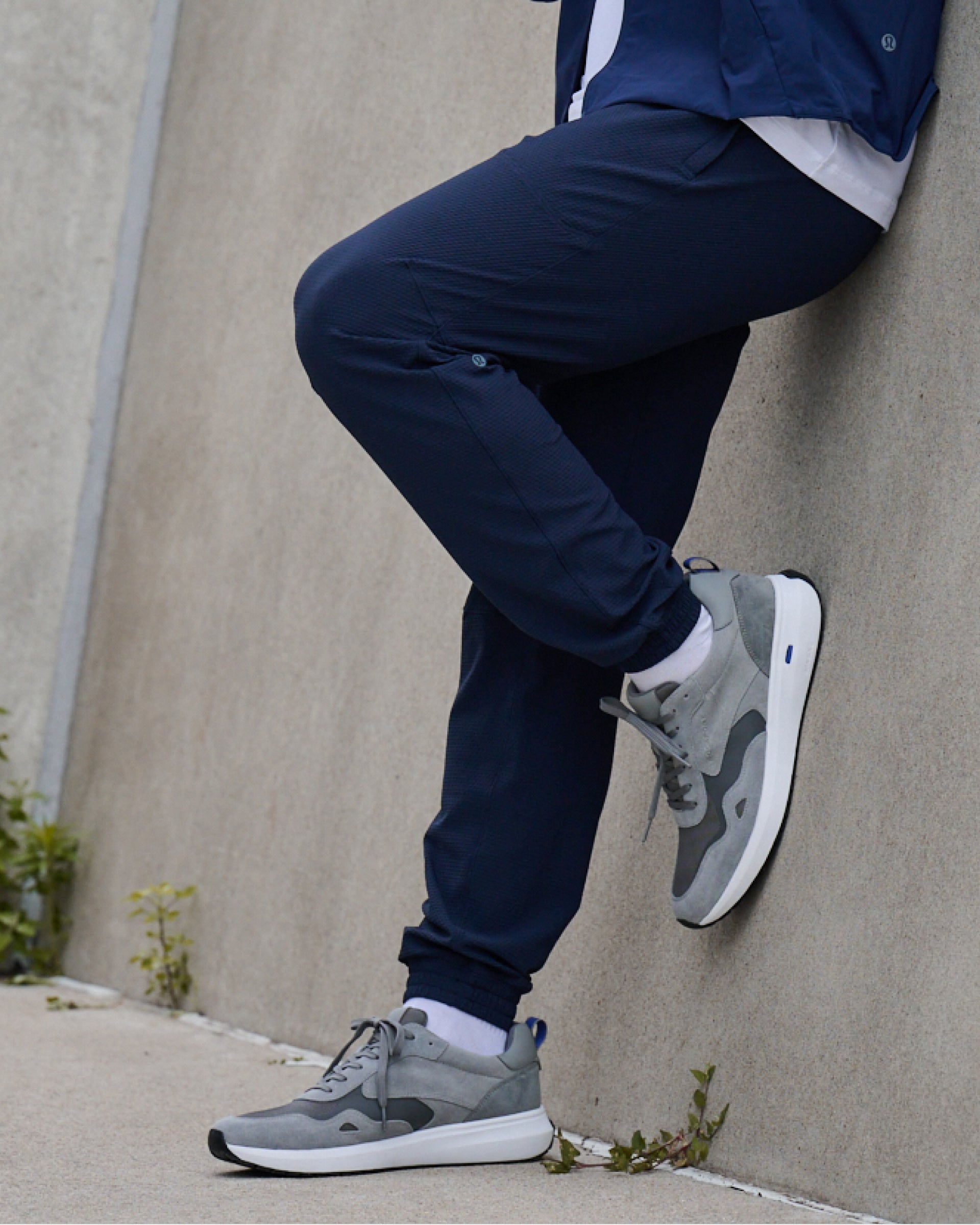 Editorial banner featuring model wearing Tilman sneakers