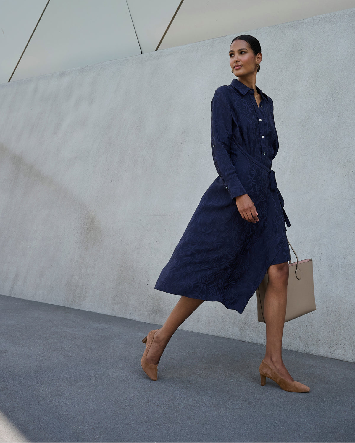 Editorial banner featuring Women's Total Motion Merida Classic Dress Pumps