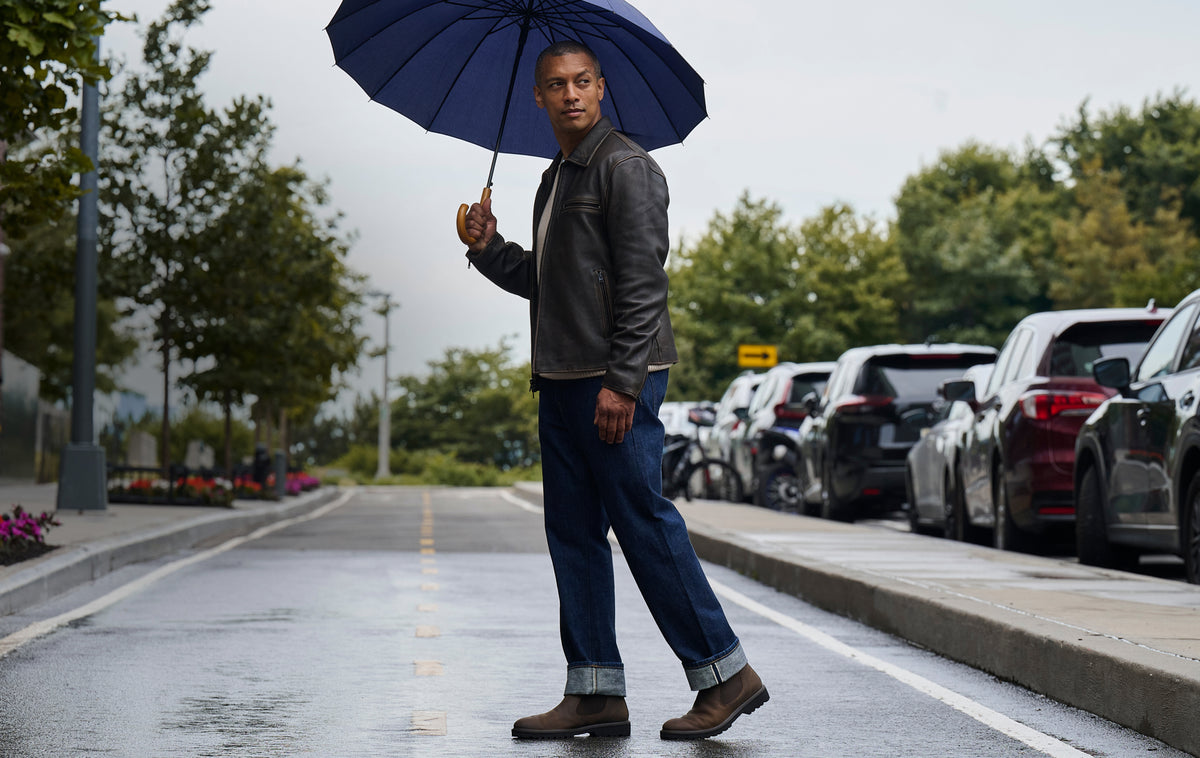 Editorial banner featuring model wearing Marcello boots