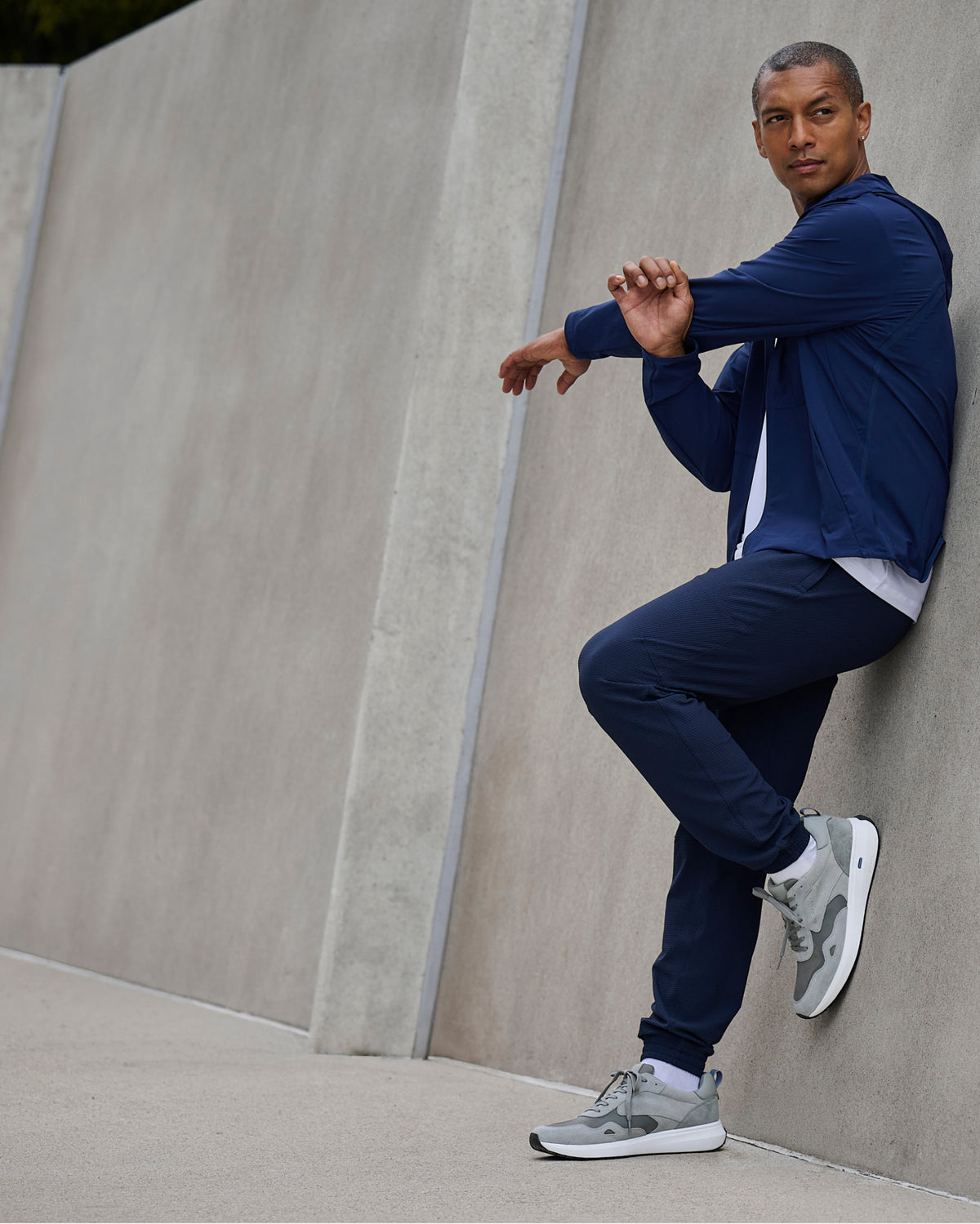 Editorial banner featuring model wearing Tilman Lace-up Casual Sneakers