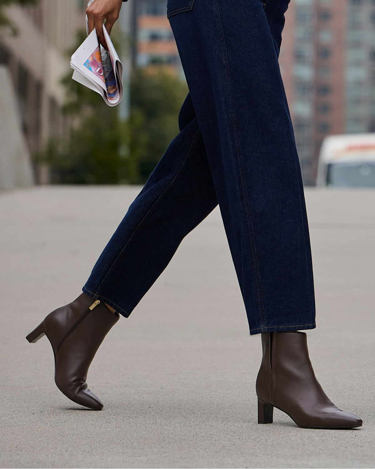 Editorial banner featuring model wearing Marisa booties